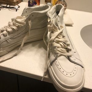 White leather high top vans
